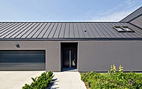 003-gray-house-polands-modern-architectural-marvel-in-swierczyniec.jpg