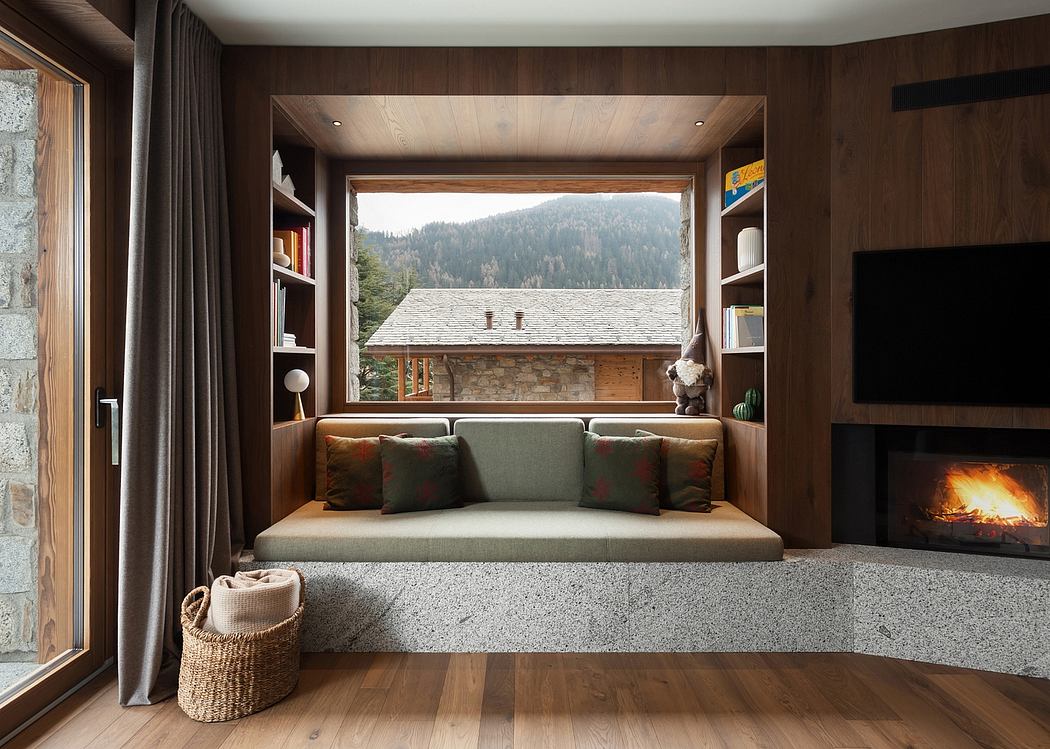 Cozy nook with fireplace, window seat, and mountain view.