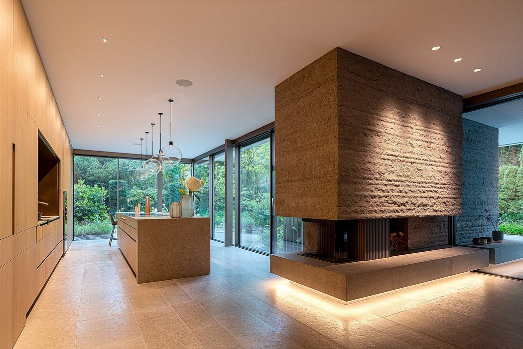 Spacious open-plan living area with large windows, modern fireplace, and minimalist decor.