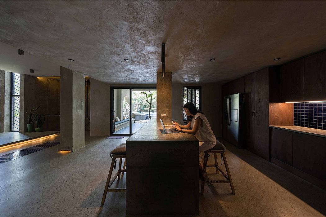 Contemporary interior with minimalistic design and concrete finishes.