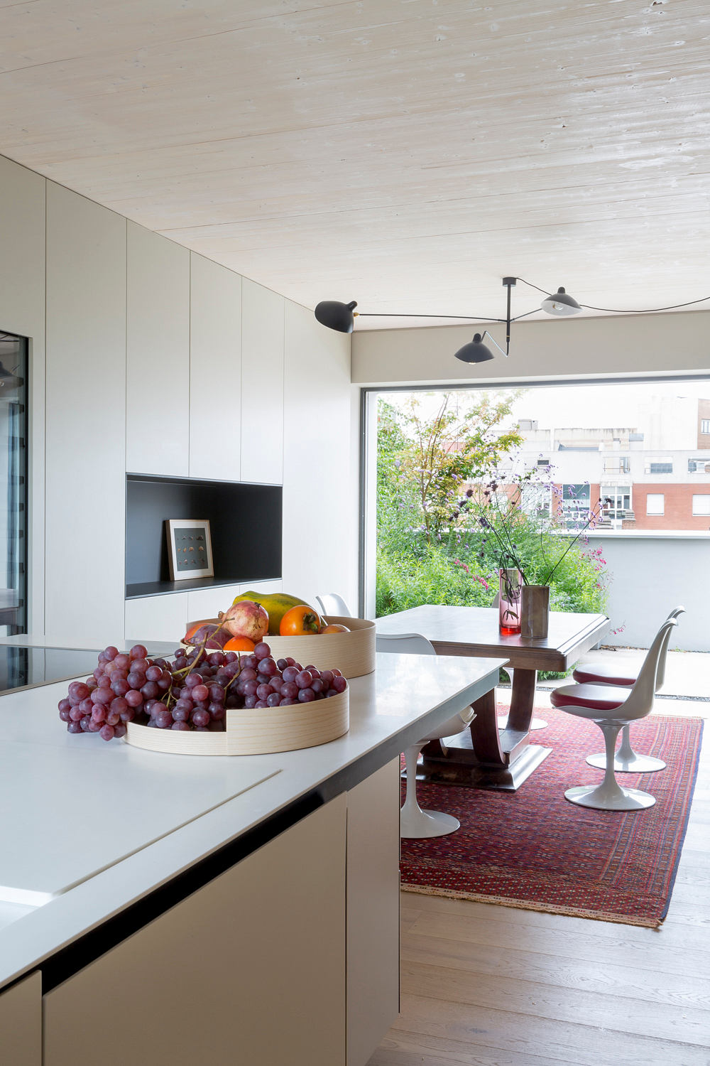 Contemporary kitchen with a sleek design and outdoor access.