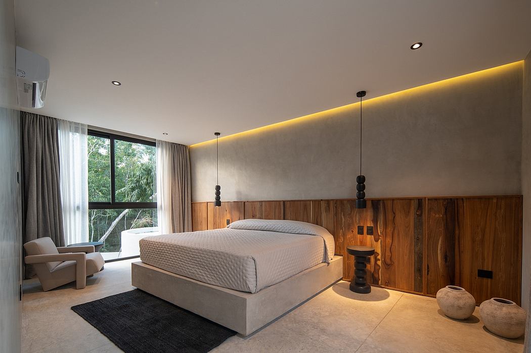 Modern bedroom with wooden wall panels, pendant lights, and large window.
