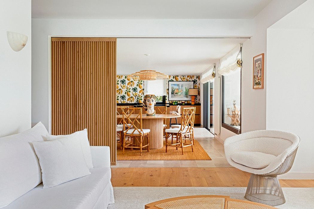 Open-concept living area with warm, natural wood elements and mid-century modern furnishings.