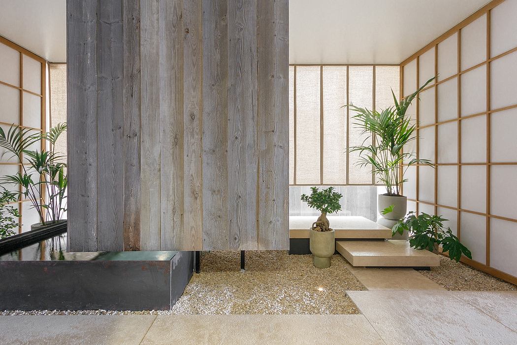 Rustic wooden walls, sleek built-in planters, and minimalist decor create a serene, Zen-like space.