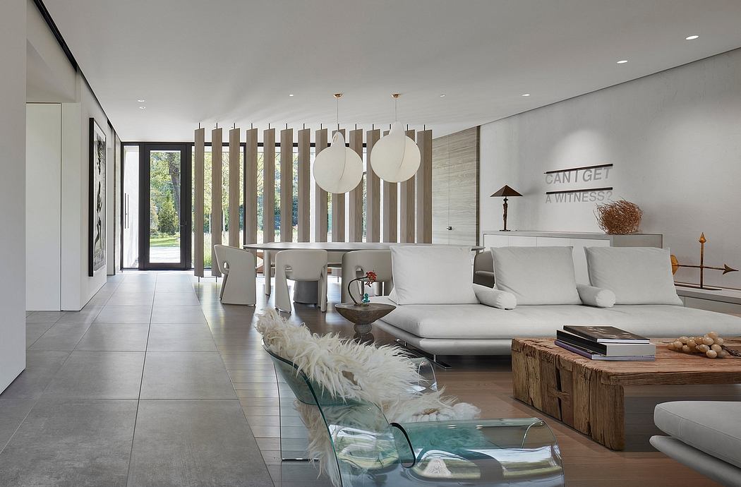 Contemporary living space with sleek furniture and wooden accents.