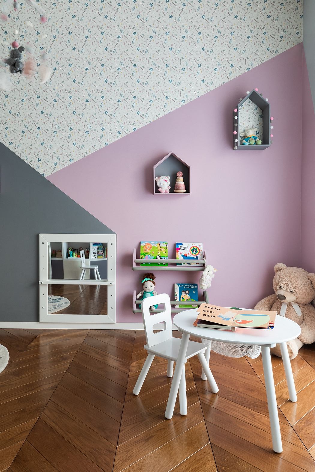 Contemporary children's play corner with pastel walls and geometric patterns.