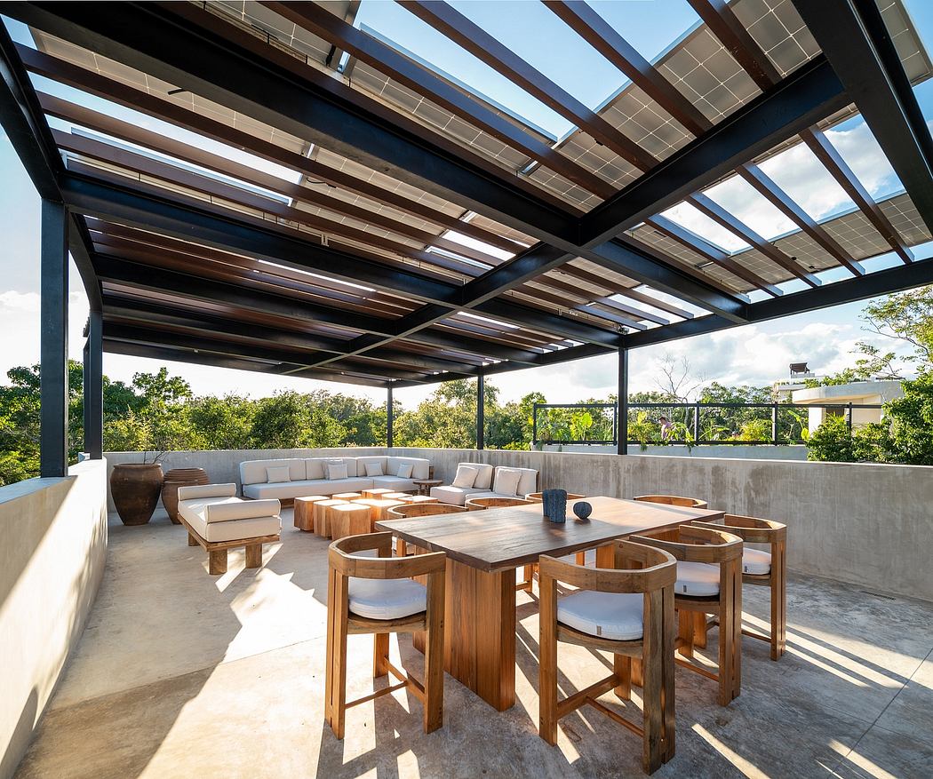 Outdoor patio with solar panel roof, wooden dining set, and corner lounge area.