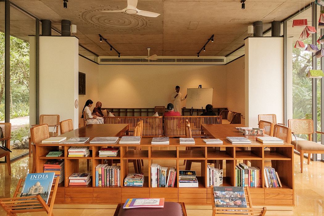 A warm, inviting classroom setting with wooden furnishings, shelving, and natural light.