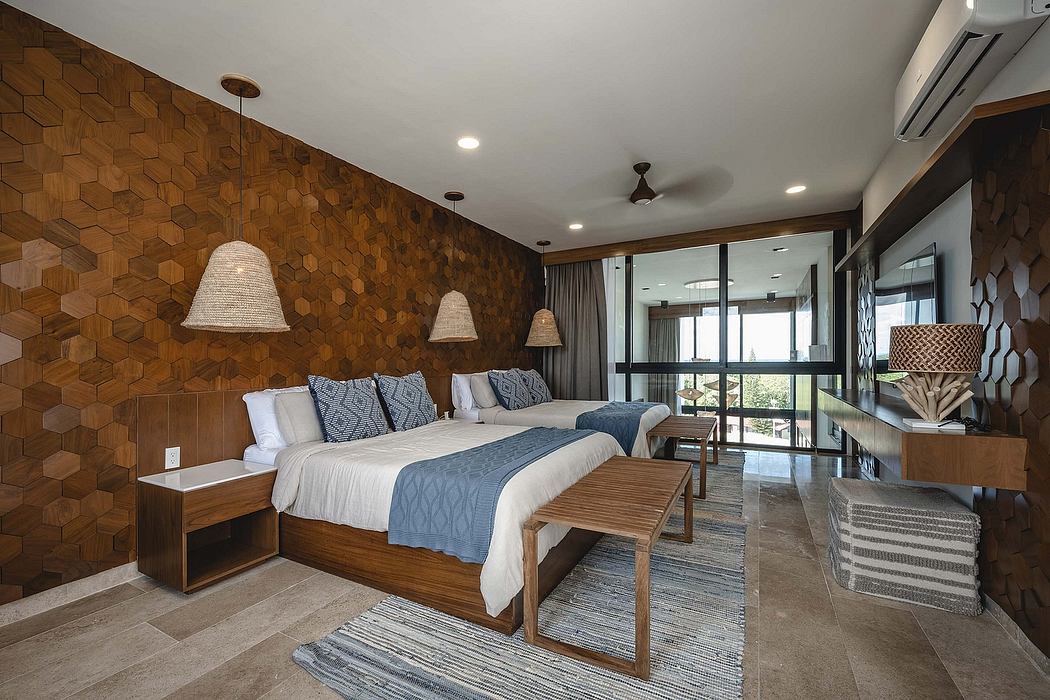 Modern bedroom with wooden accent wall, double bed, and balcony access.