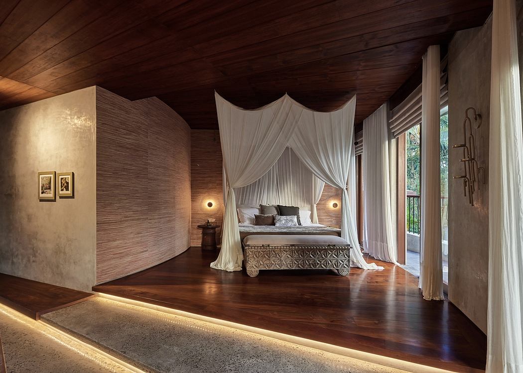 Luxurious bedroom with wooden ceiling, canopy bed, and dramatic lighting accentuating the space.