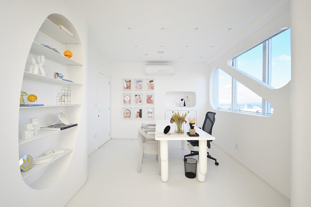 Sleek, modern office with curved shelves, minimalist decor, and large window letting in natural light.
