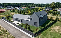 023-gray-house-polands-modern-architectural-marvel-in-swierczyniec.jpg