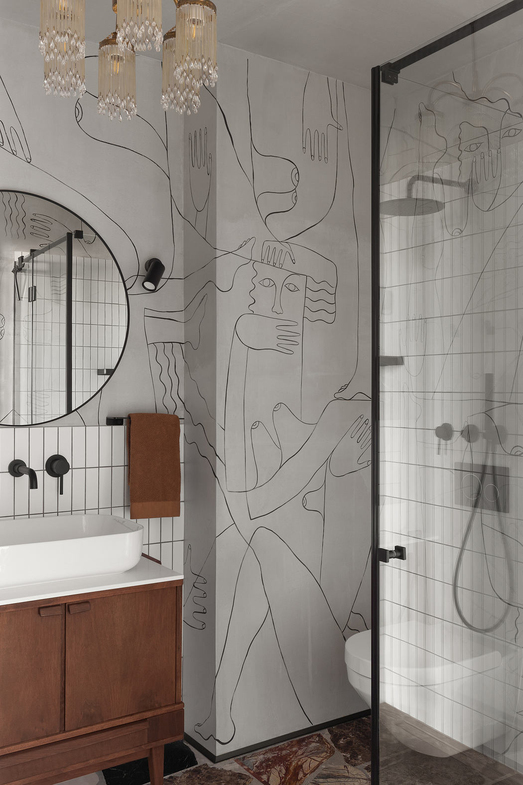 A contemporary bathroom with abstract artsy wall mural, modern vanity, and crystal chandeliers.