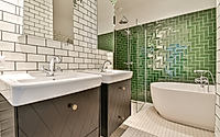 Stylish bathroom with unusual brick tiles