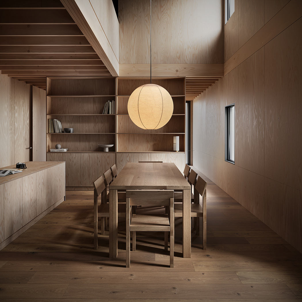 Minimalist wooden dining room with built-in shelves, a paper lantern, and a long table.