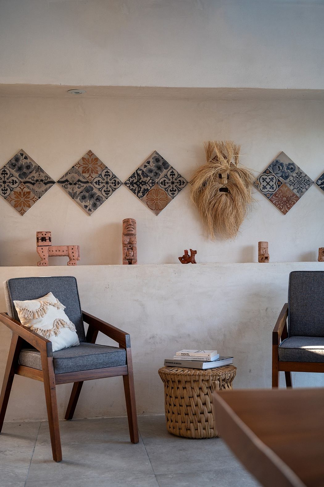 Warm-toned decor with patterned tiles, woven accents, and rustic wall hangings.