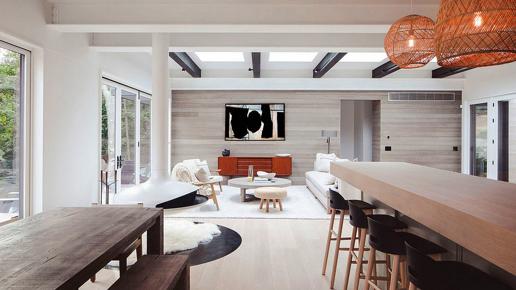 Warm, modern interior with clean lines, natural materials, and recessed lighting.