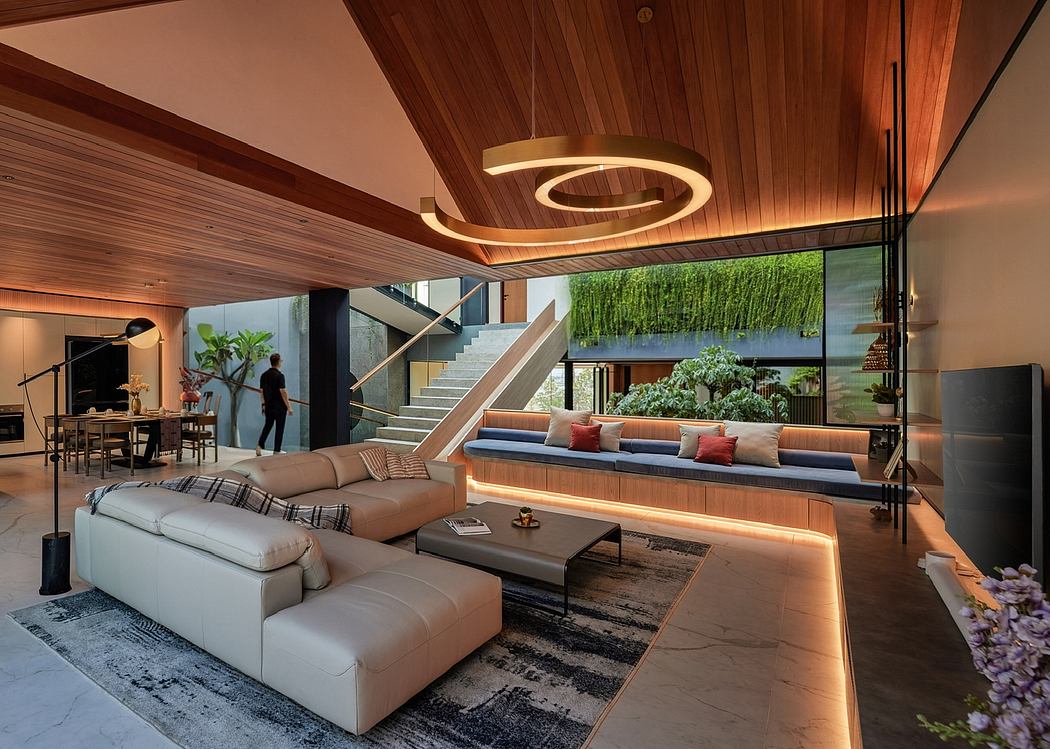 Luxurious modern living room with wooden ceiling, circular lighting, and cozy seating.