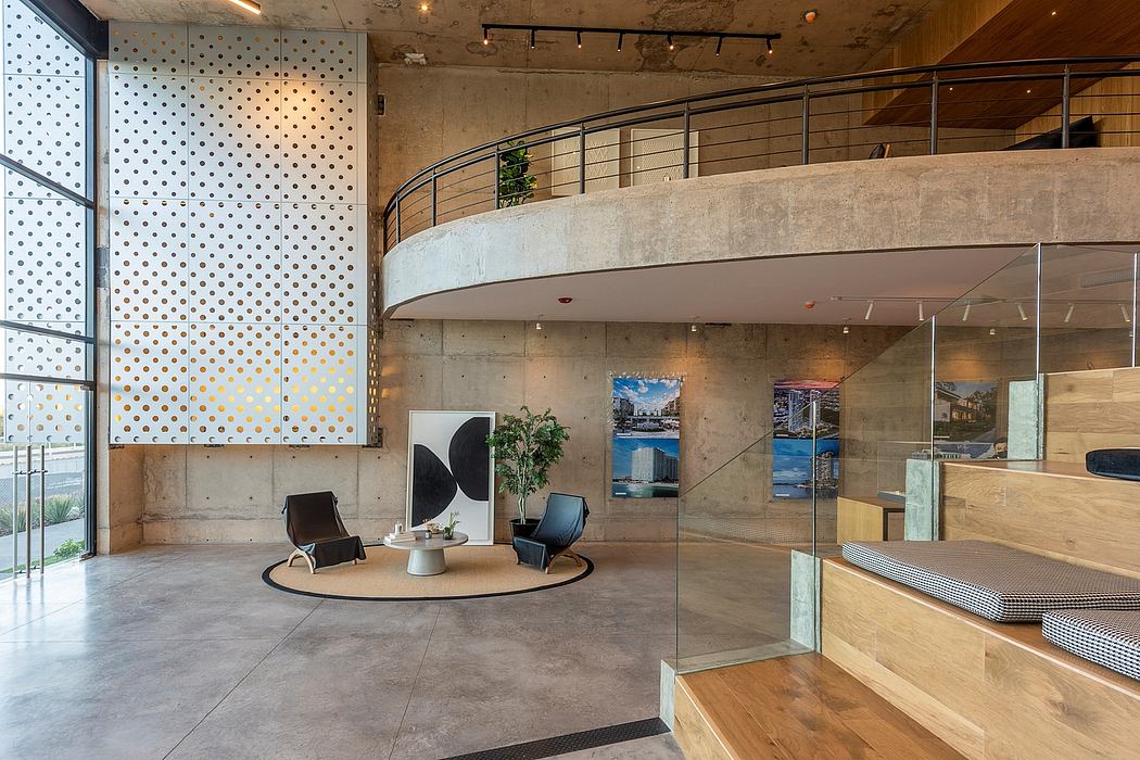 A modern, industrial-style interior with concrete walls, metal railings, and stylish furniture.