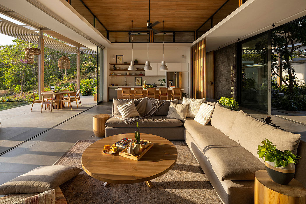 Cozy open-plan living area with wooden ceiling, plush seating, and nature-inspired decor.