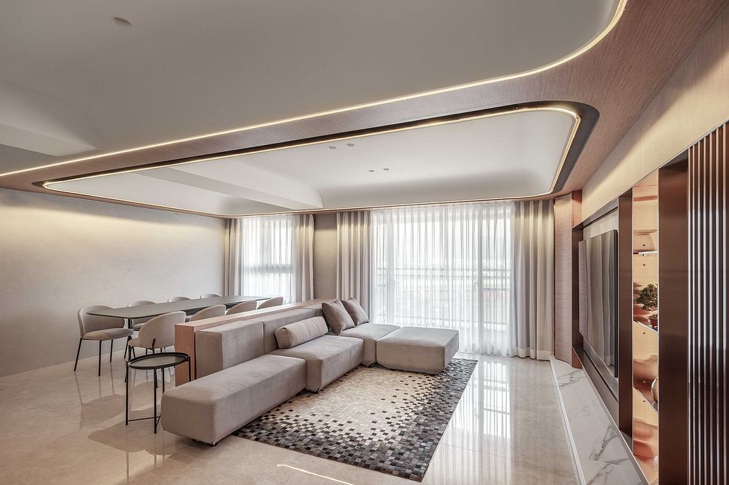 Modern living room with elegant lighting design, marble floors, and plush seating.