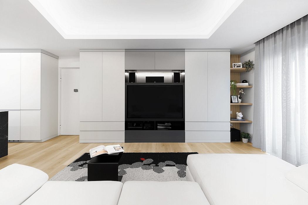 Sleek, minimalist living room with built-in entertainment unit and shelving.