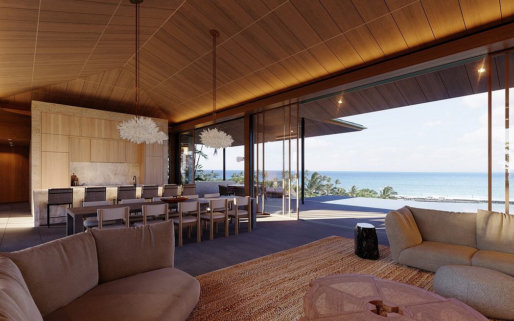 Expansive open-plan space with soaring vaulted ceilings, panoramic ocean views, and modern furnishings.