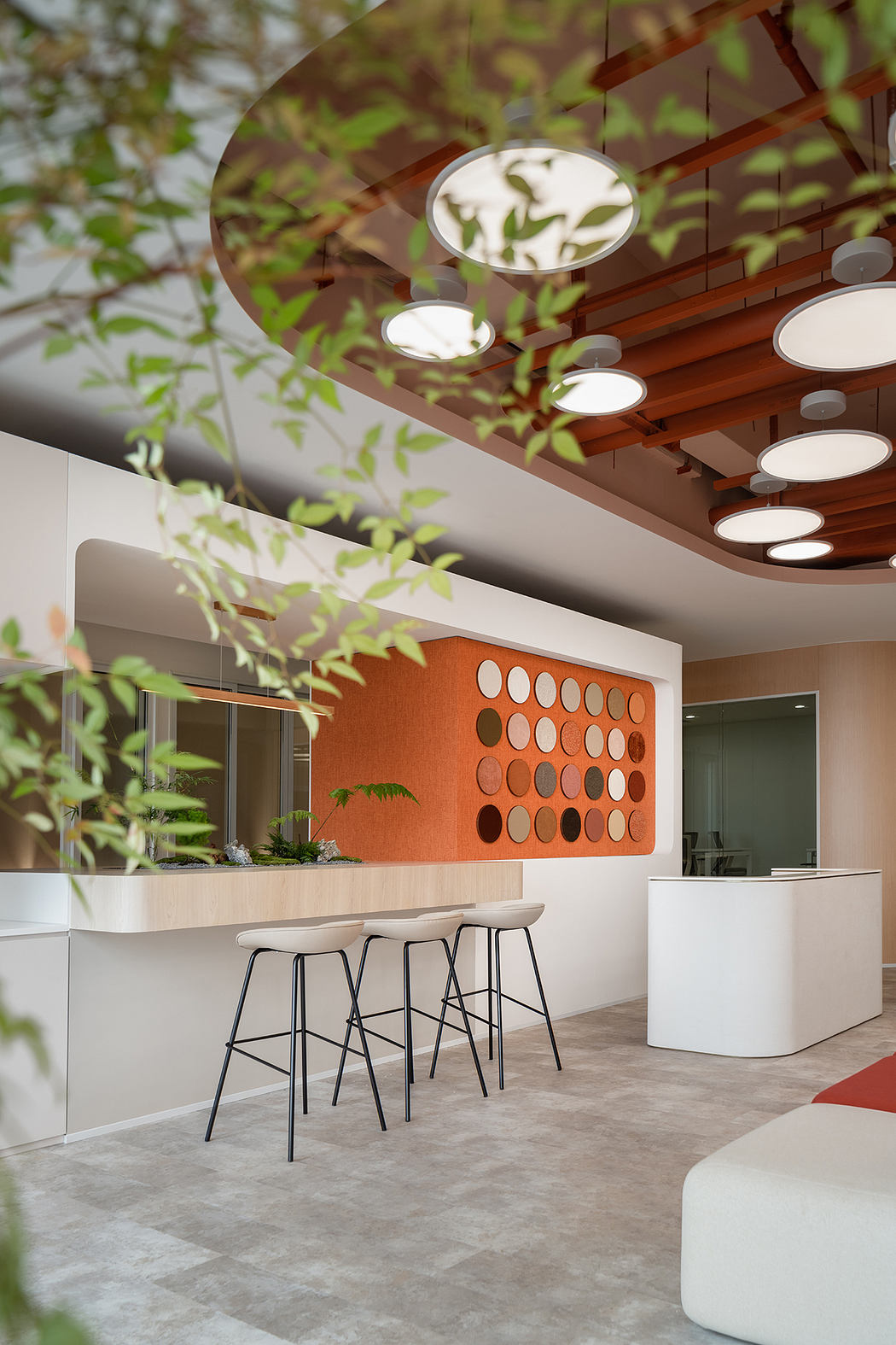 A modern, nature-inspired interior with a vibrant color scheme and geometric patterns.