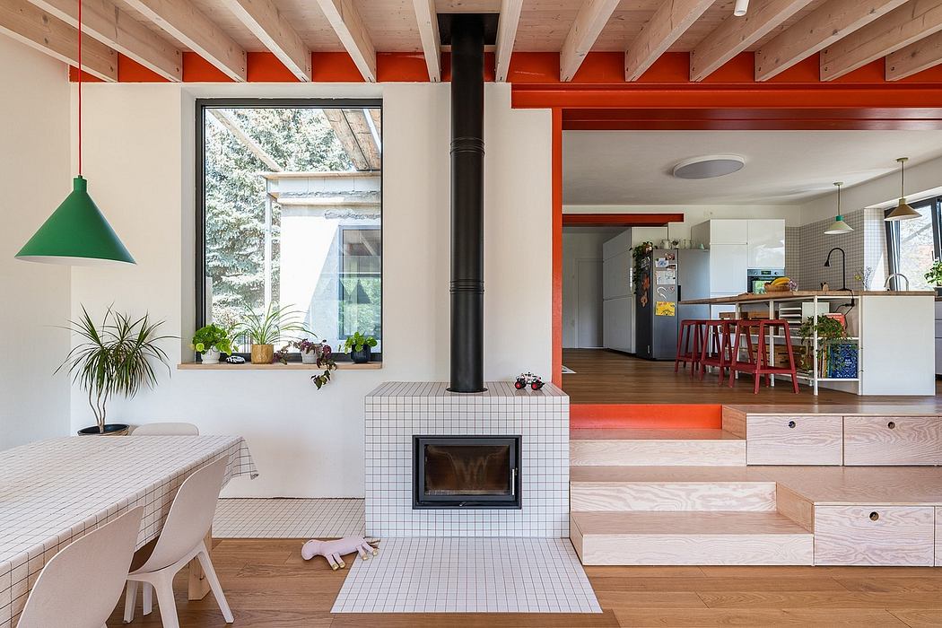 An open-concept interior space with a mix of modern and rustic elements, including wooden beams, a fireplace, and colorful accents.