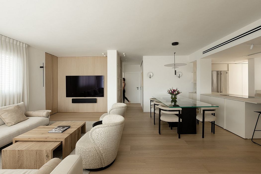 Spacious, open-concept living room and dining area with wooden accents and modern furnishings.