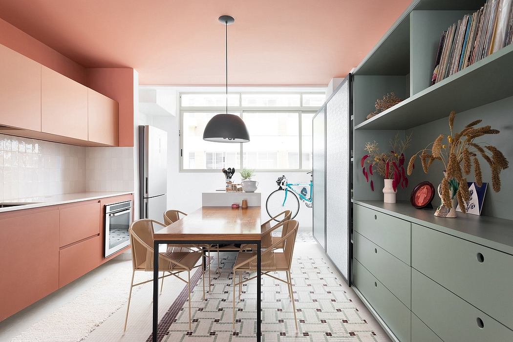 Vibrant open-plan kitchen and dining area with modern furniture and decor.