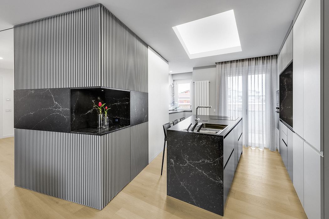 Sleek, modern interior with black marble accents, distinctive architectural features.