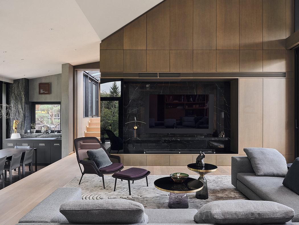 Luxurious living room featuring sleek wood paneling, large stone fireplace, and modern furniture.