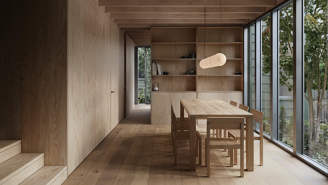 Minimalist interior with wooden floors, walls, and built-in shelving; large dining table.