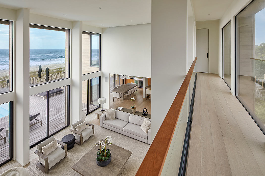 Spacious open-concept living area with expansive ocean views and modern furnishings.