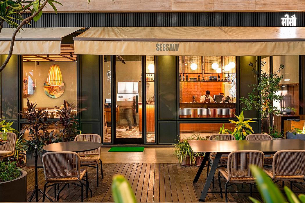 Warm, earthy tones, natural materials, and greenery create a welcoming café atmosphere.