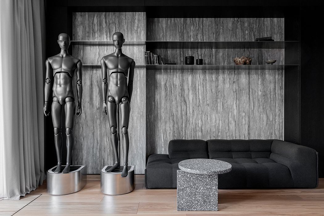 Minimalist living room with abstract mannequins, sleek furniture, and textured walls.