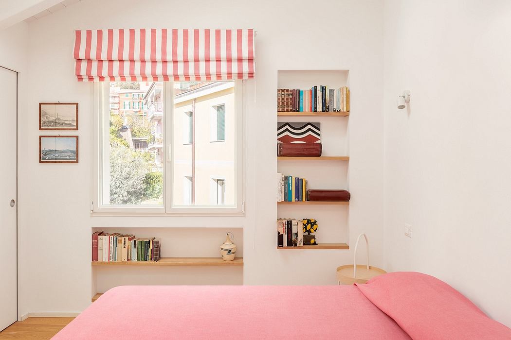 Cozy bedroom with geometric window treatments, built-in shelving, and warm lighting.