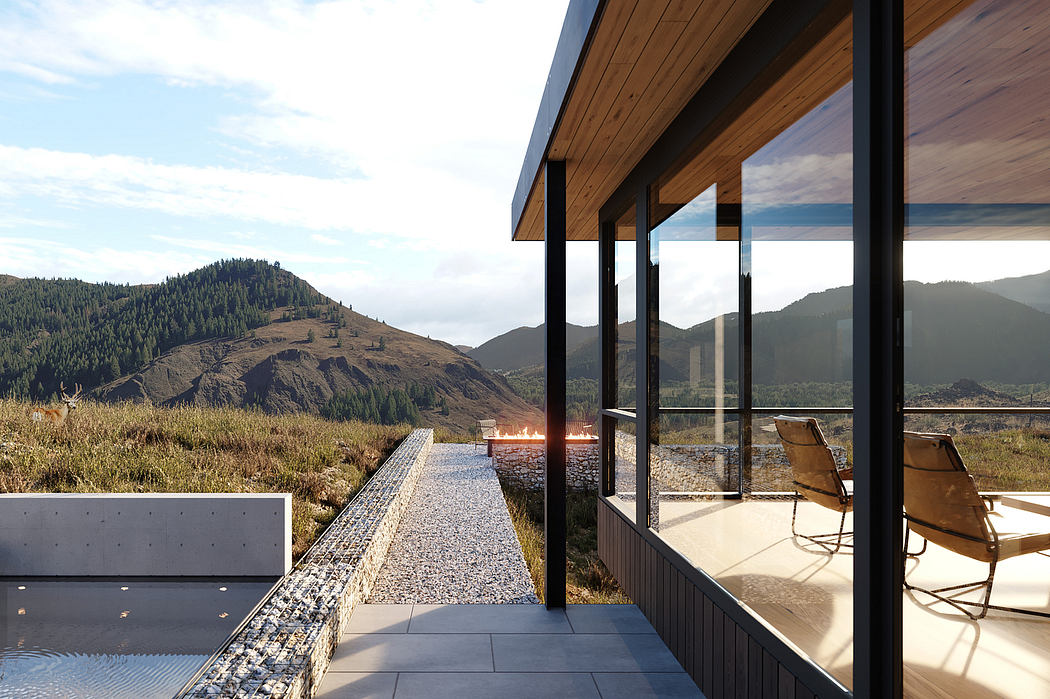 Stunning mountain retreat with modern architecture, glass walls, and outdoor firepit.