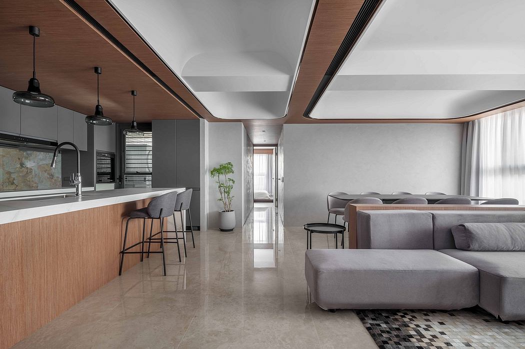 Sleek, modern interior design with wooden accents, minimalist furniture, and open floor plan.