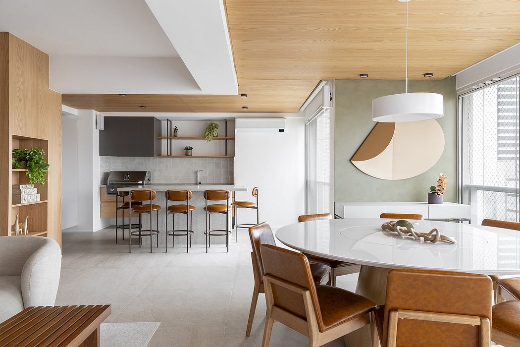 A modern open-concept living space with warm wood tones, minimalist furnishings, and stylish lighting.