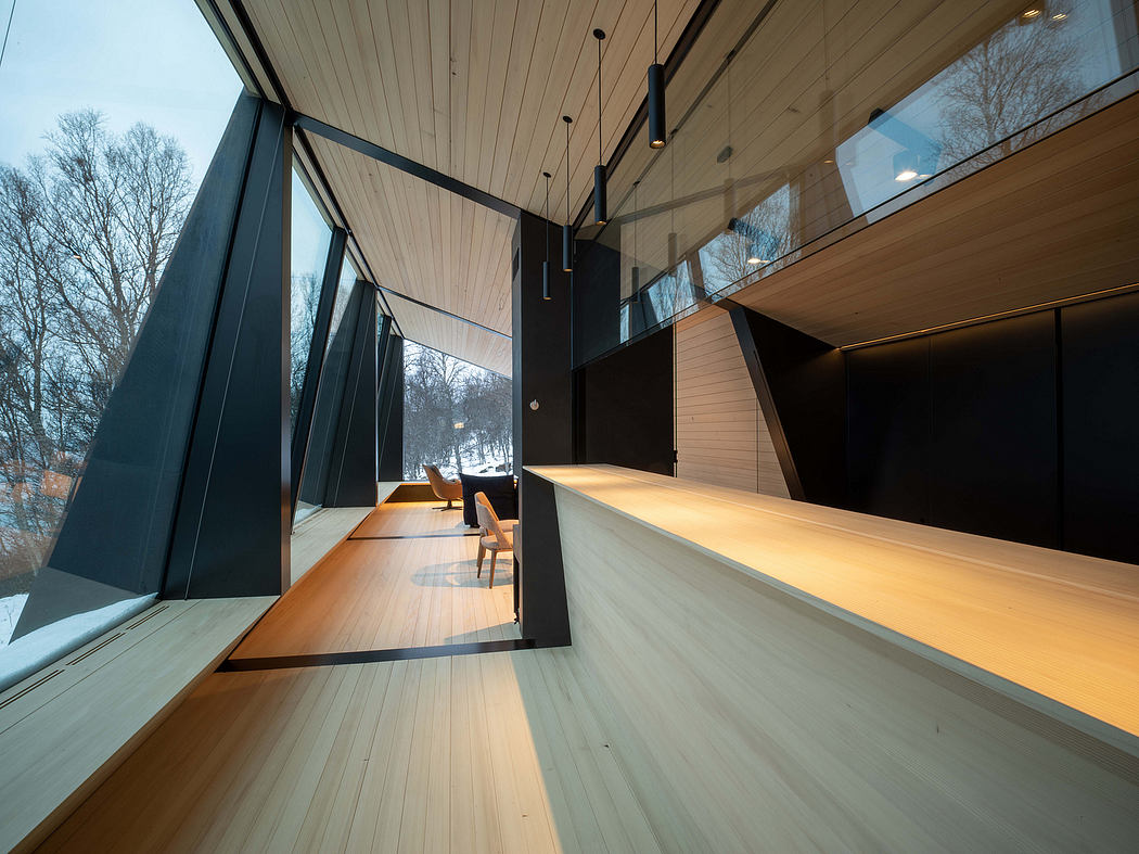 Modern wooden architectural interior with sleek lines, large windows, and recessed lighting.