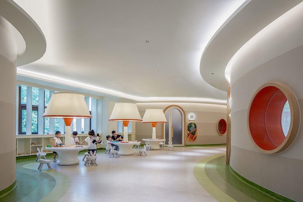 Spacious, modern interiors with curved walls, vibrant colors, and playful furnishings.