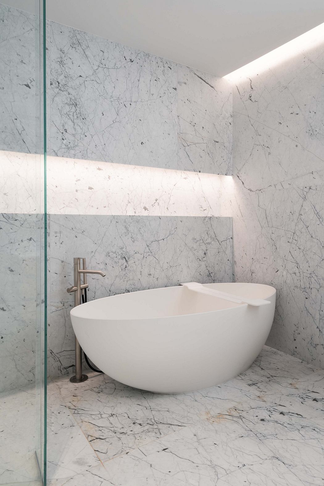 A modern and minimalist bathroom with a freestanding white tub and marble walls.