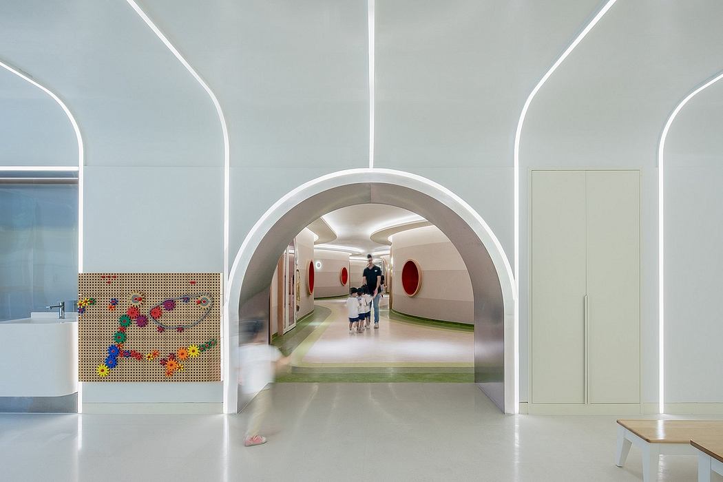 A modern, whimsical interior with arched entryways, colorful decor, and an open, airy layout.