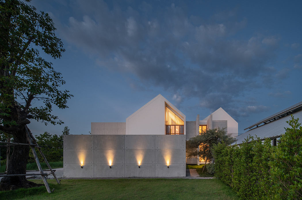 Sleek, modern architecture with concrete walls, geometric shapes, and strategic lighting.