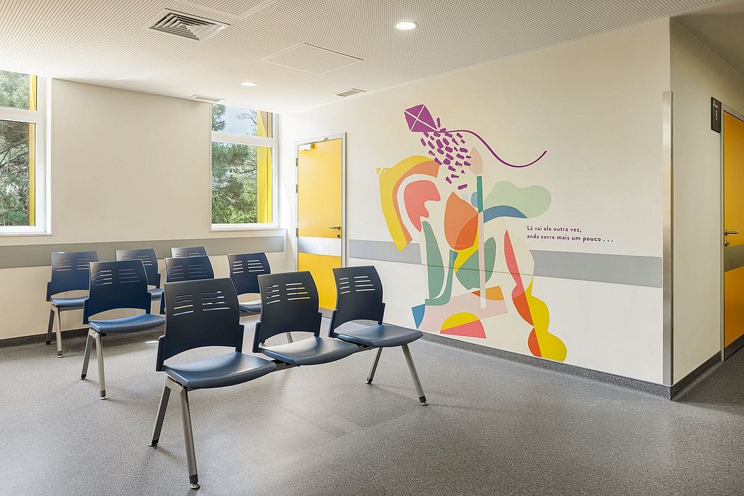 Bright, colorful, and modern interior design with abstract mural artwork and functional seating.