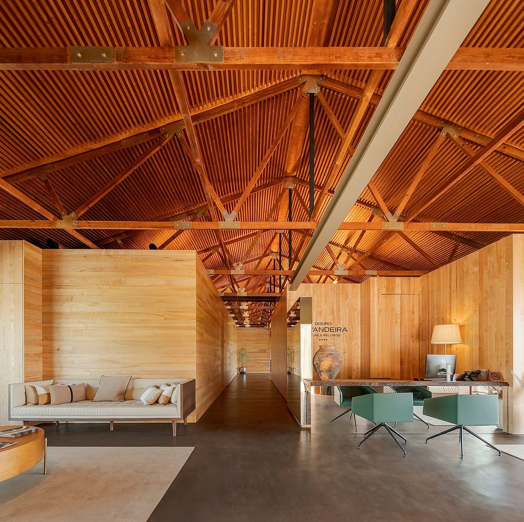 A modern, open-concept interior with wooden beams and furnishings, complemented by sleek decor.