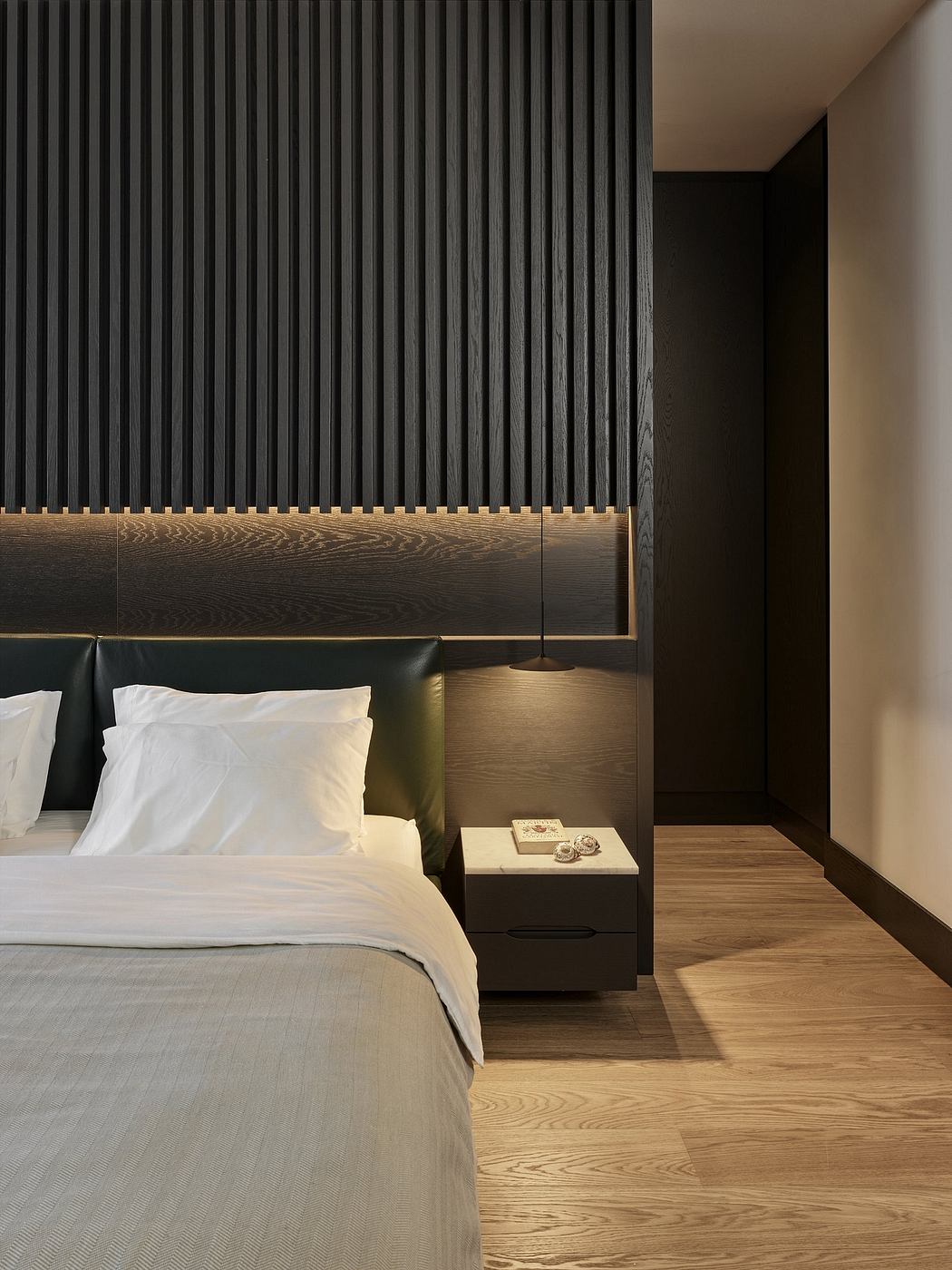 Minimalist bedroom interior with dark vertical panels, wooden accents, and sleek nightstand.