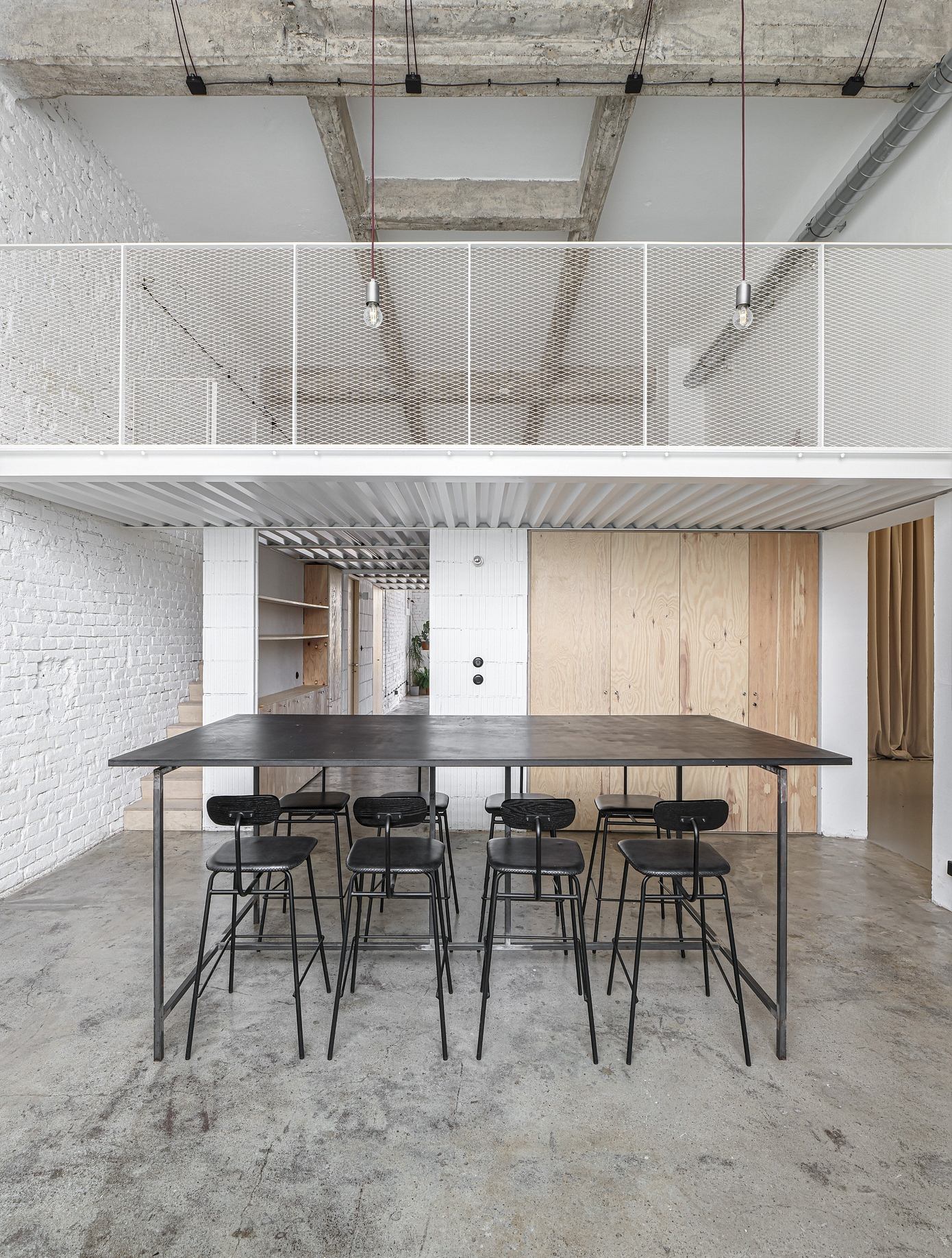 Monolot Offices: A Minimalist Industrial Transformation in Prague